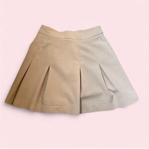 Cream pleated mini skirt